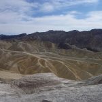 A photograph of a mountainous desert landscape.