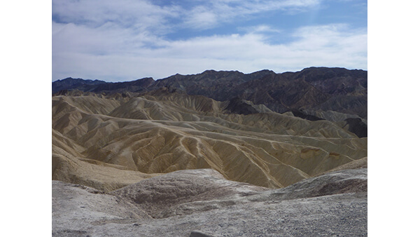 A photograph of a mountainous desert landscape.