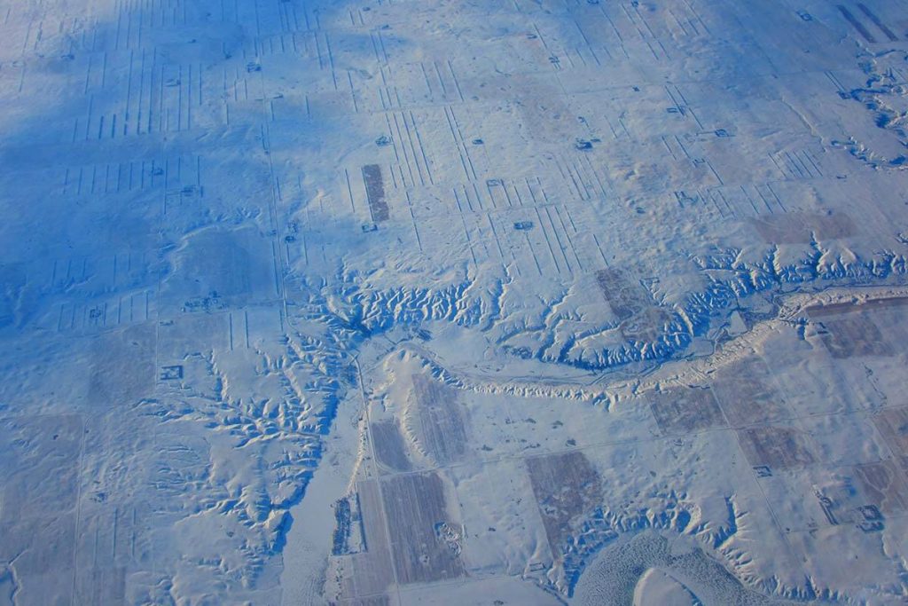 An aerial photograph of a snowy landscape.