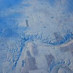 An aerial photograph of a snowy landscape.