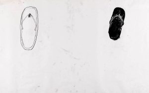 A drawing of two flip-flops - one white and one black.