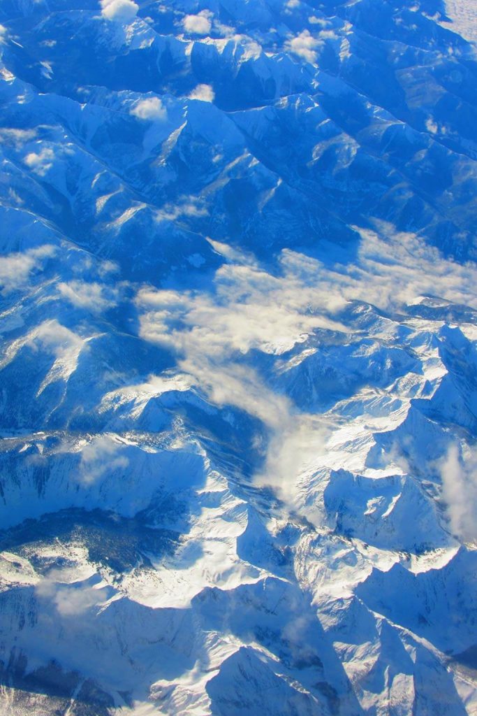 Photograph of snowy mountains taken from above